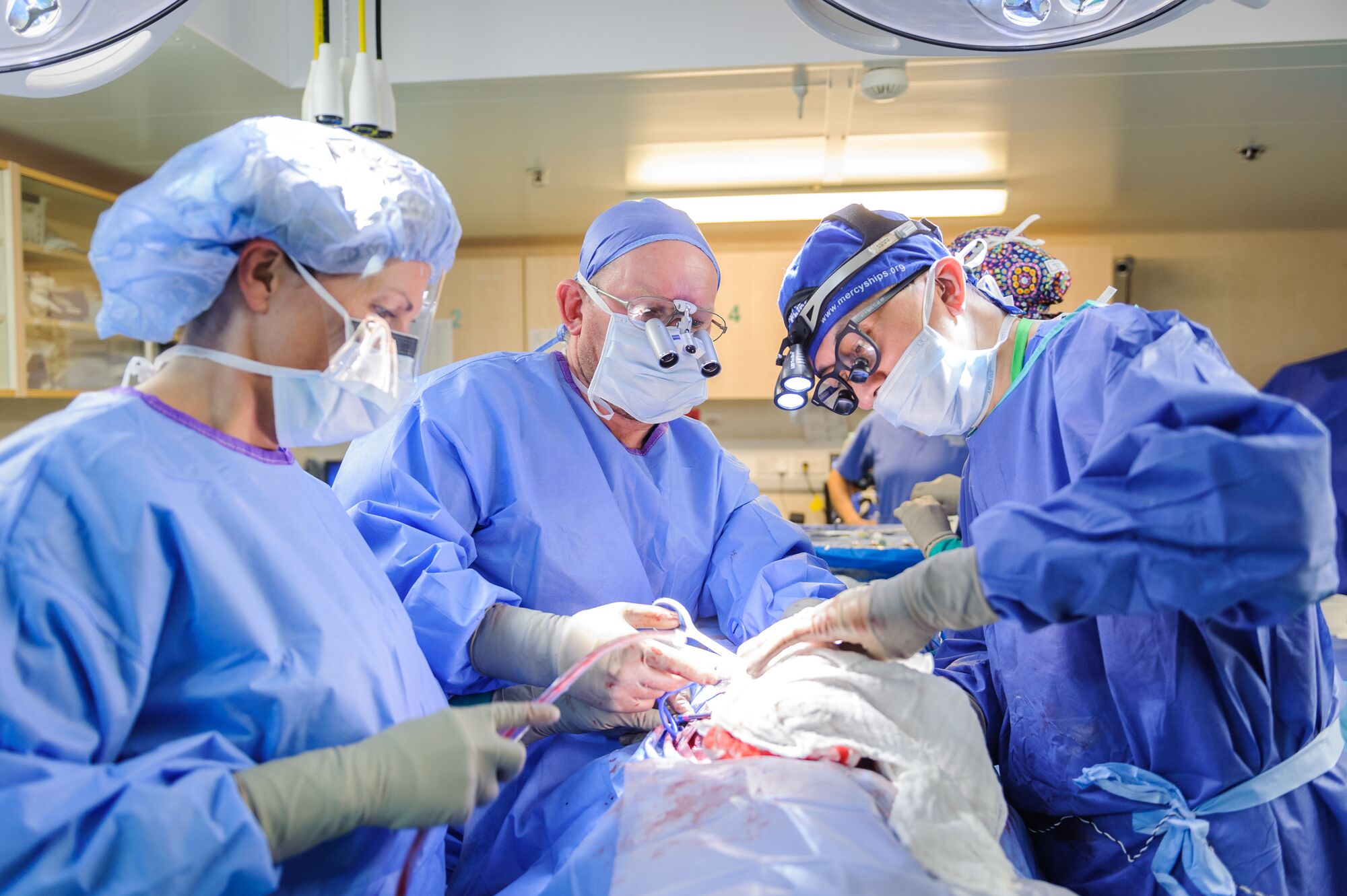 Several weeks at a time have added up to more than two decades of service, without Leo leaving behind his surgical career in the UK.