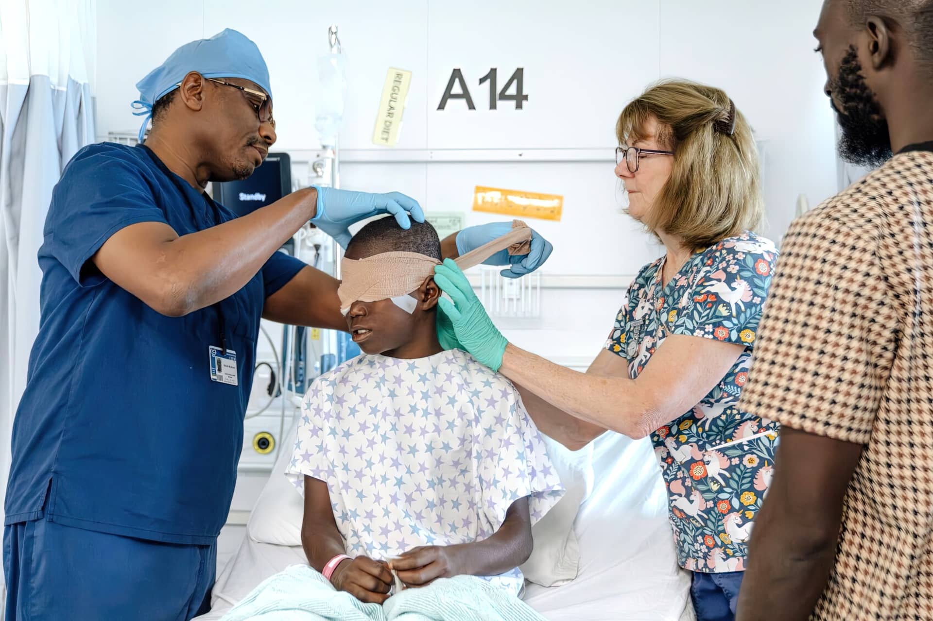The morning after surgery, Abdul's bandages were removed. When the surgeon held up his fingers, Abdul could see them.