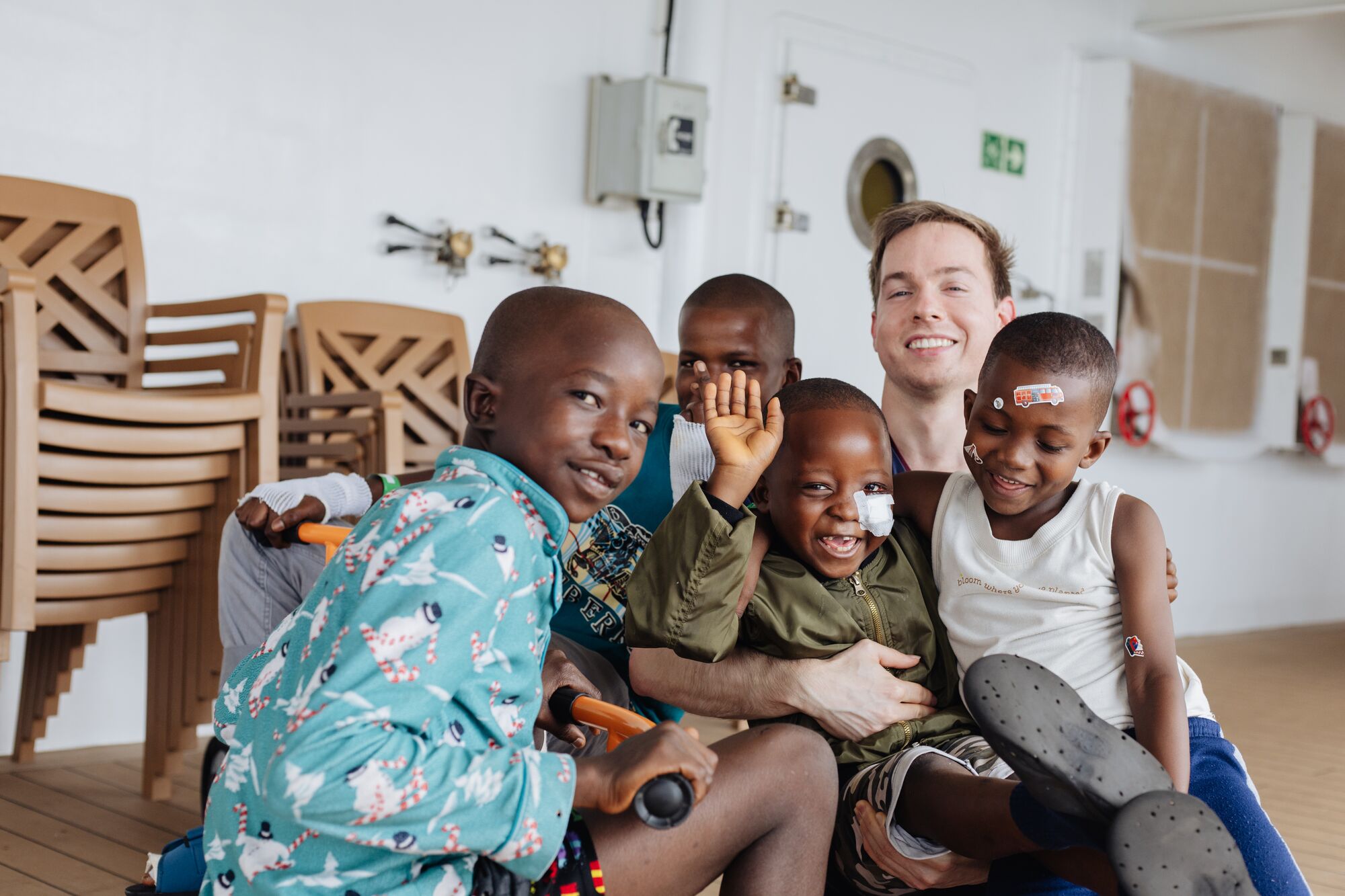 Surrounded by love, Abubakarr’s vibrant personality has flourished. Despite facing physical challenges since birth, the warmth and care from his family helped him grow into a boy full of hope and resilience.