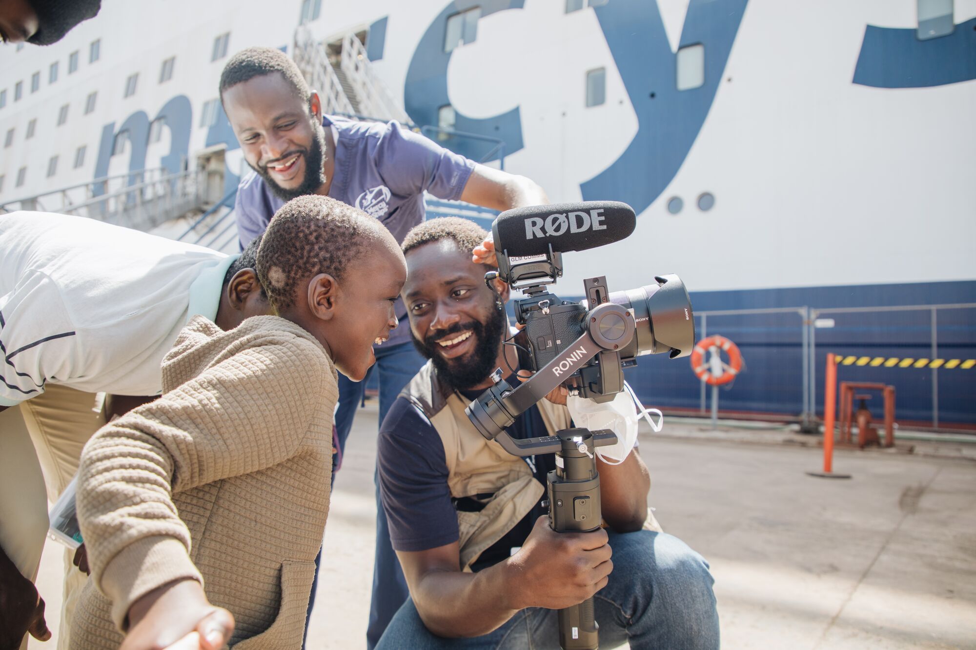 For Eugene, a camera is more than a piece of equipment. It gives him a front-row seat to moments of courage, care and transformation, and the opportunity to help share those stories with others.