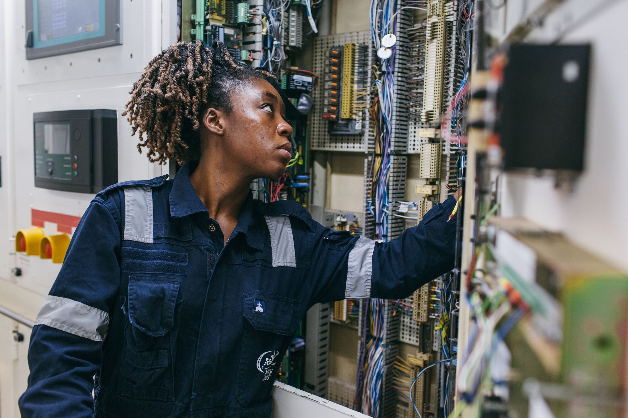 Behind the hospital is an entire ship that needs to keep running. Denise's electrical expertise helped maintain the systems that allow medical teams to focus on caring for patients.